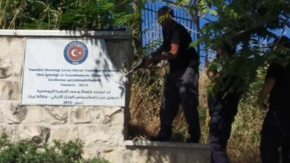 A plaque of Turkish Cooperation and Coordination Agency (TIKA) on display outside Yusufiye Cemetery, one of the oldest Muslim graveyards in occupied East Jerusalem.