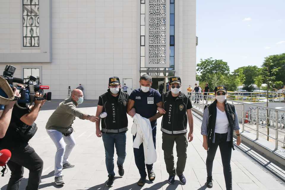 Cetin Goren (3rd R), one of main suspects, was taken into custody in Istanbul as part of Operation Swamp brought to Turkey's capital Ankara for legal procedures.