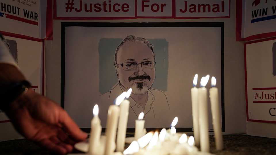 The Committee to Protect Journalists and other press freedom activists hold a candlelight vigil in front of the Saudi Embassy for slain journalist Jamal Khashoggi in Washington, US on October 2, 2019.