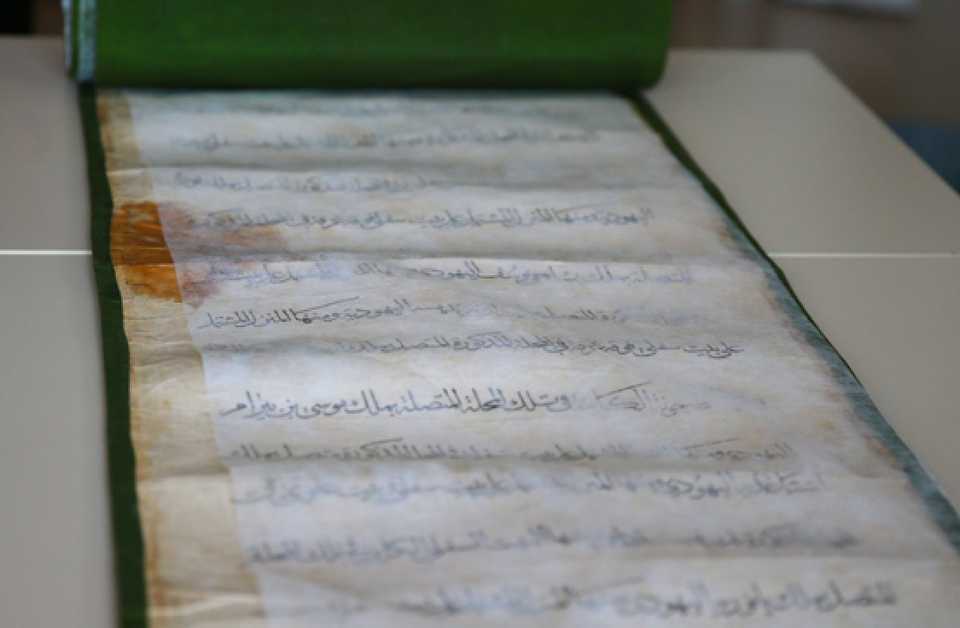 Caption: The Sultan’s charter is carefully preserved, and treated multiple times a year to ensure its longevity.