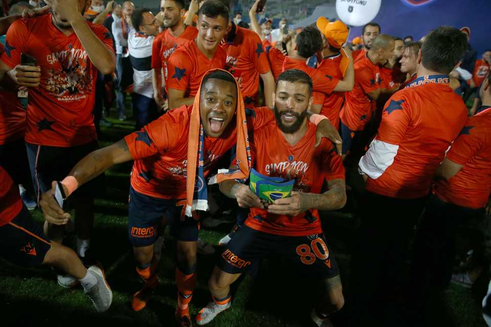 Football players celebrate as Medipol Basaksehir clinched the first ever Turkish Super Lig title after second-place Trabzonspor lost to Konyaspor 4-3, in Istanbul, Turkey on July 19, 2020.