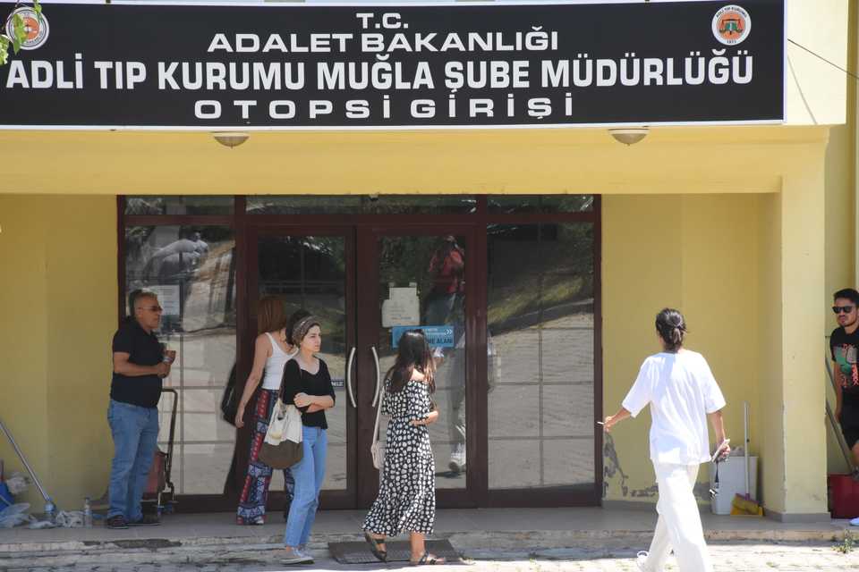 The body of missing university student, Pinar Gultekin, being brought to Forensic Medicine Institution for examination as family and friends wait outside in Mugla, Turkey on July 21, 2020.