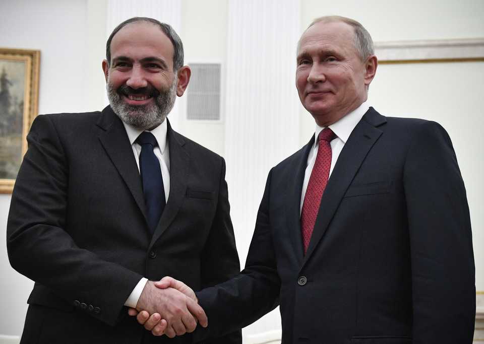 Russian President Vladimir Putin shakes hands with Armenian Prime Minister Nikol Pashinyan in the Kremlin in Moscow, Russia December 27, 2018.