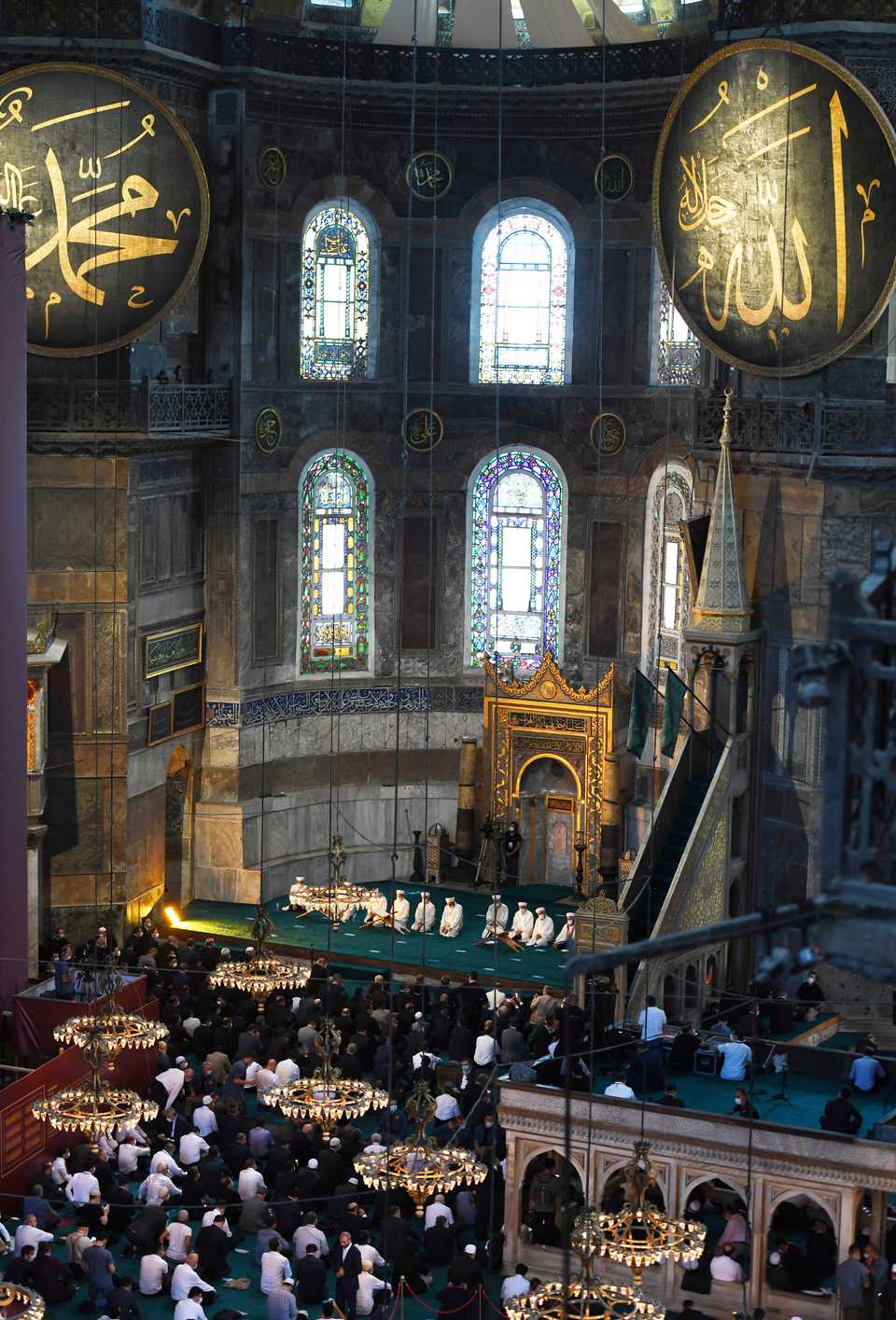 People perform Friday prayer inside the newly converted Hagia Sophia Grand Mosque alongside Turkish President Recep Tayyip Erdogan in Istanbul, Turkey on July 24, 2020.
