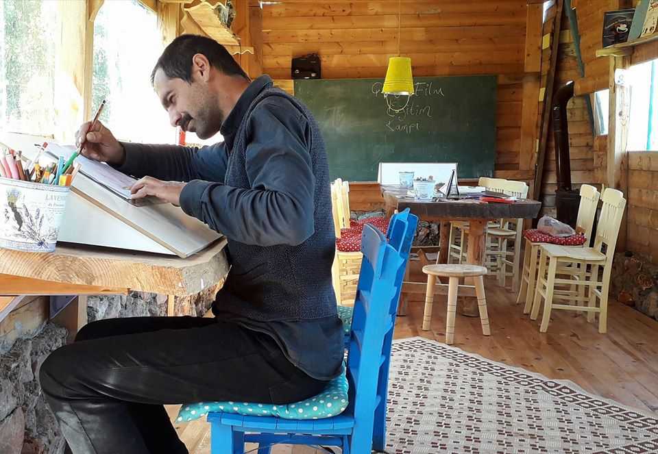 Fatih Kucuk at his drawing board in Kas, Antalya.