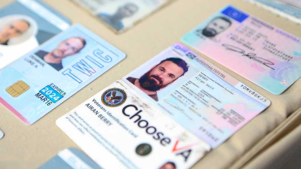 This photo released by the Venezuelan Miraflores presidential press office shows what Venezuelan authorities identify as the the IS cards of former US special forces citizen Airan Berry, right, and Luke Denman, left, in Caracas, Venezuela on May 4, 2020.