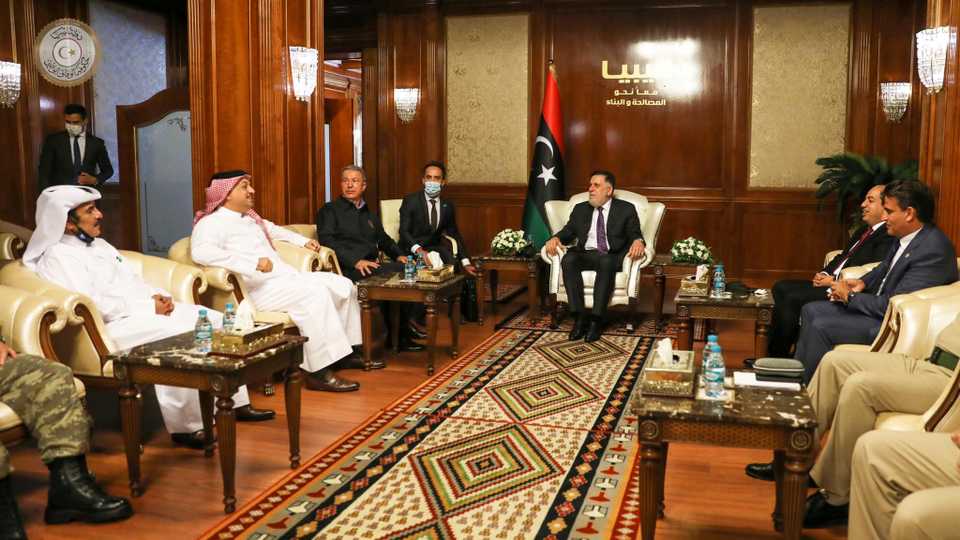 Libya's internationally recognised Prime Minister Fayez al Sarraj meets with defence ministers of Turkey, Hulusi Akar, and Qatar, Khalid bin Mohammad Al Atiye, in Tripoli, Libya August 17, 2020.
