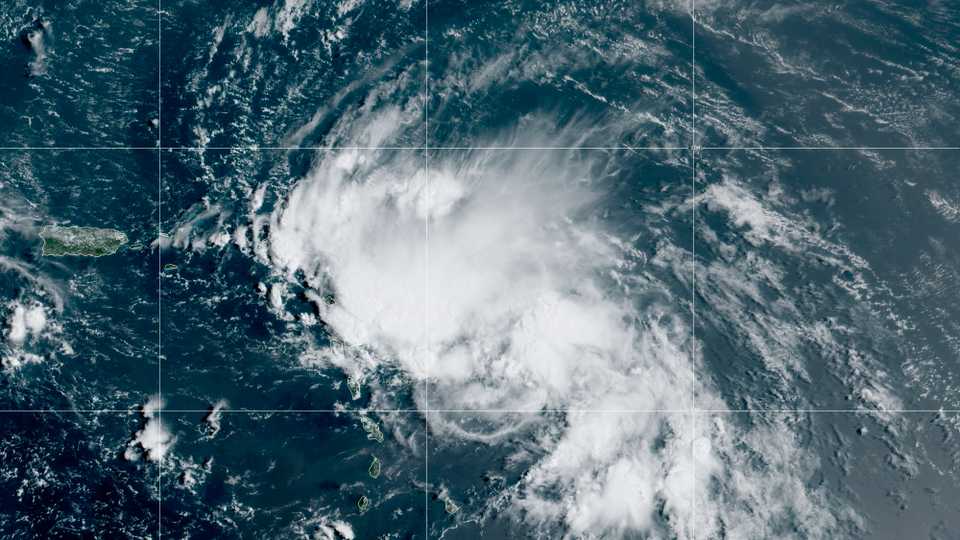 This satellite image released by the National Oceanic and Atmospheric Administration (NOAA) shows Tropical Storm Laura in the North Atlantic Ocean, Friday, Aug. 21, 2020.