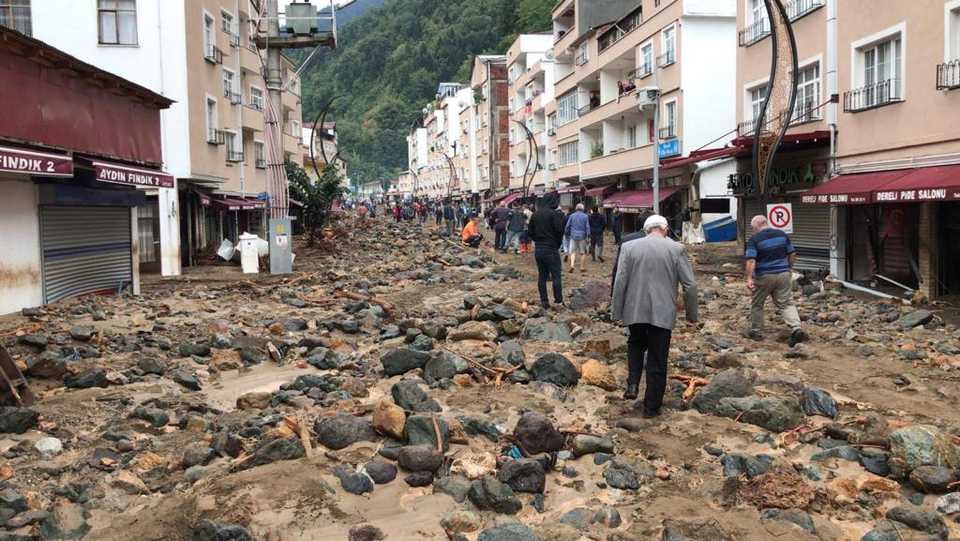 Heavy rain in Giresun's Dereli district damaged many workplaces after the river overflowed in the district center.