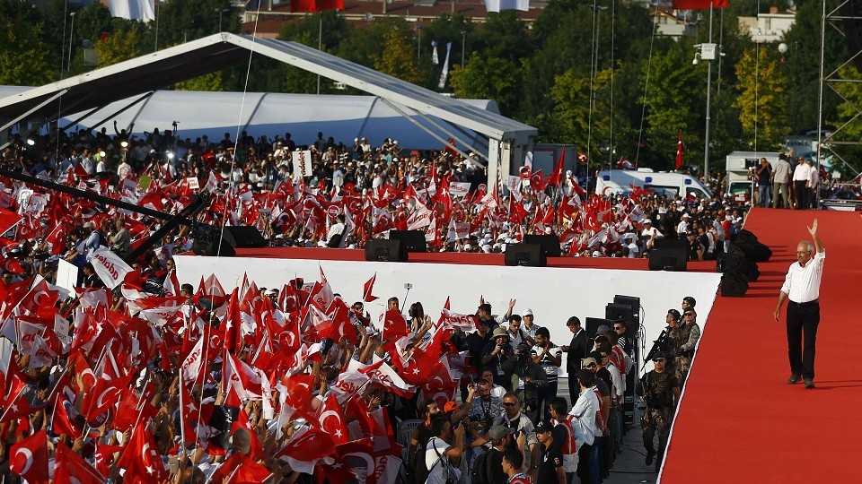 Kemal Kilicdaroglu, leader of main opposition Republican People's Party (CHP), greets his supporters during a rally to mark the end of his 25-day long protest in Istanbul, Turkey July 9, 2017. 
