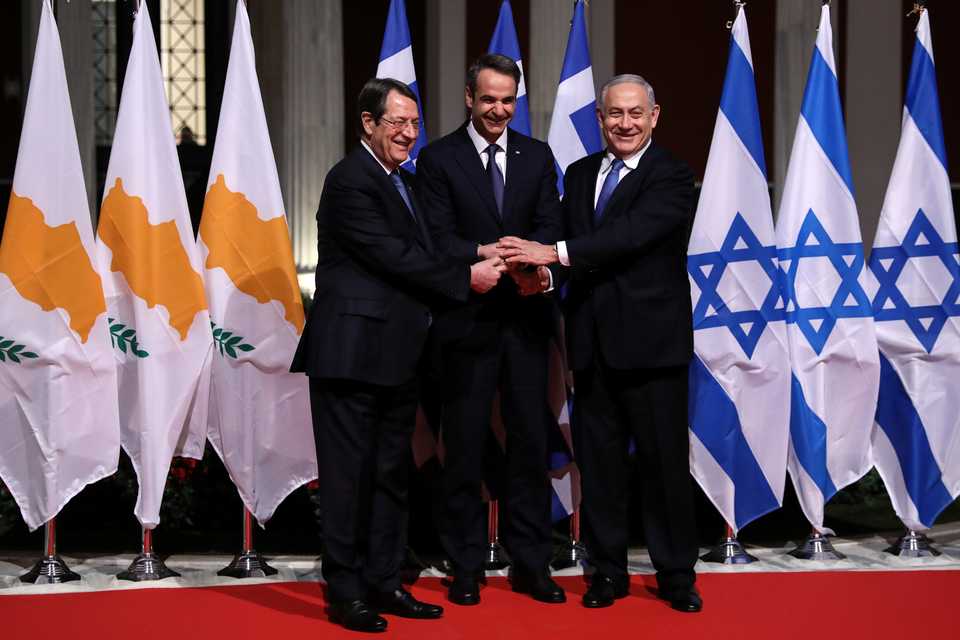 (From L to R) Greek Cypriot administration leader Nicos Anastasiades, Greek Prime Minister Kyriakos Mitsotakis and Israeli Prime Minister Benjamin Netanyahu pose for a photo before signing a deal to build the EastMed subsea pipeline to carry natural gas from the eastern Mediterranean to Europe, in Athens, Greece, January 2, 2020.