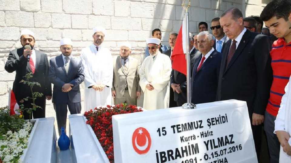 Turkey's President Recep Tayyip Erdogan and Prime Minister Binali Yildirim visit the graves of July 15 victims on Tuesday as part of the week-long commemoration of the failed coup last year.