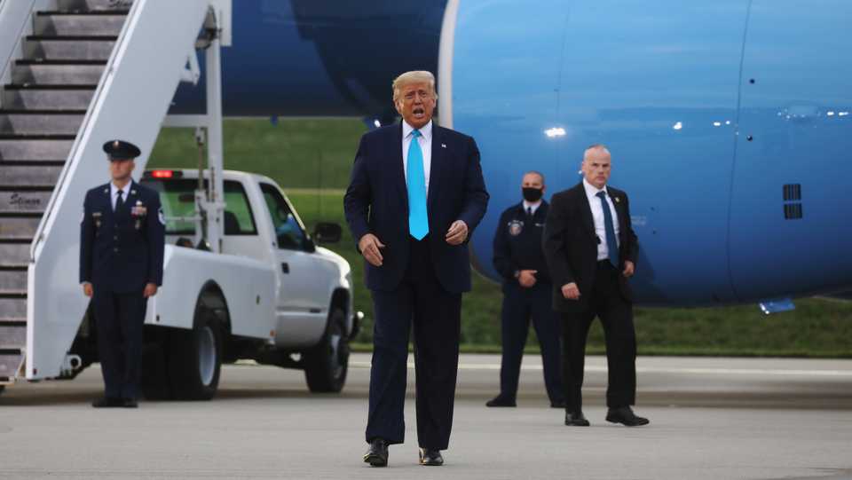US President Donald Trump disembarks Air Force One to deliver a campaign speech at Arnold Palmer Regional Airport in Latrobe, Pennsylvania, US, September 3, 2020.