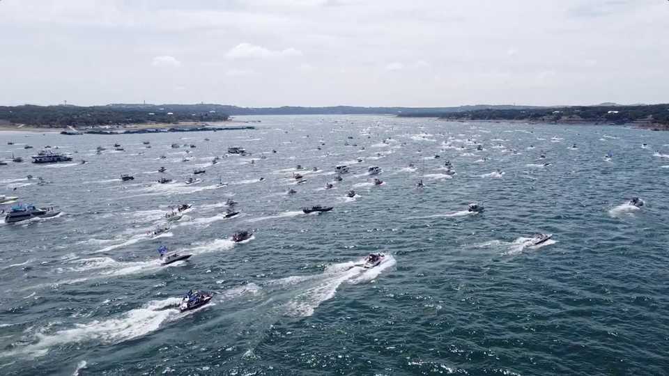 Boats take part in a parade on Lake Travis in Texas, US September 5, 2020, in this still image obtained from a social media video.