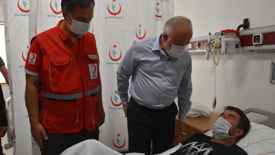 Turkish Red Crescent President Kerem Kinik visits wounded personnel in hospital in Gaziantep, Turkey, September 14, 2020.