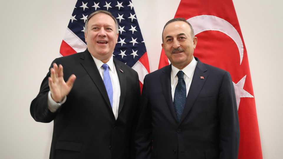 Turkish Foreign Minister Mevlut Cavusoglu (R) meets with U.S. Secretary of State Mike Pompeo (L) within the NATO Foreign Ministers Meeting in Brussels, Belgium on November 20, 2019.