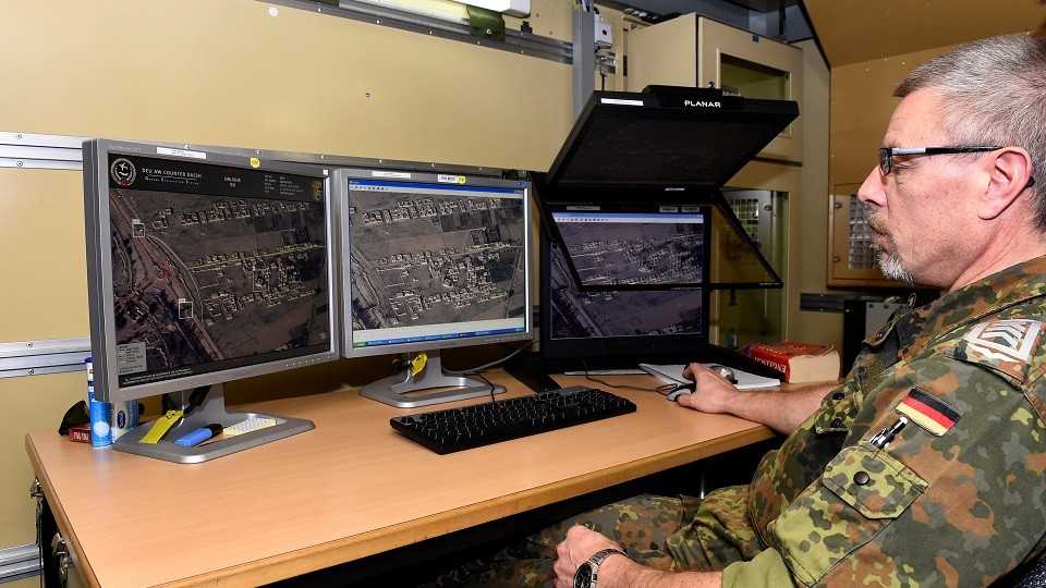  A soldier of the German Armed Forces Bundeswehr looks at pictures taken by a German Tornado jet at the so-called "Ground Exploitation Station" (GES) at the air base in Incirlik, Turkey, January 21, 2016.