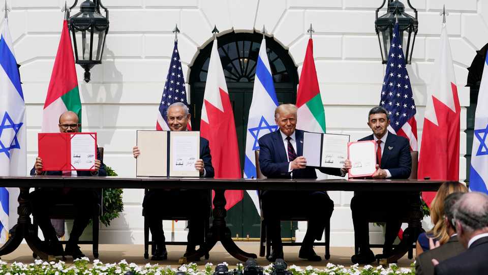 President Donald Trump, center, with from left, Bahrain Foreign Minister Khalid bin Ahmed Al Khalifa, Israeli PM Netanyahu, Trump, and UAE FM Abdullah bin Zayed al Nahyan, during a signing ceremony at the White House, September, 15, 2020.