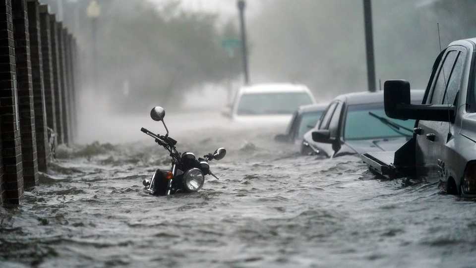 Floodwaters move on the street in Florida’s Pensacola as Hurricane Sally made landfall near Gulf Shores, Alabama Wednesday, September 16, 2020