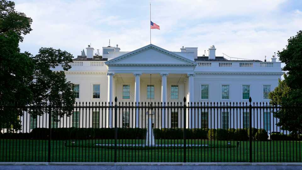 An American flag flies at half-staff over the White House in Washington. September 19, 2020.