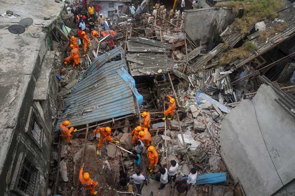 Rescuers look for survivors after a residential building collapsed in Bhiwandi in Thane district, a suburb of Mumbai, India, Monday, Sept 21, 2020.