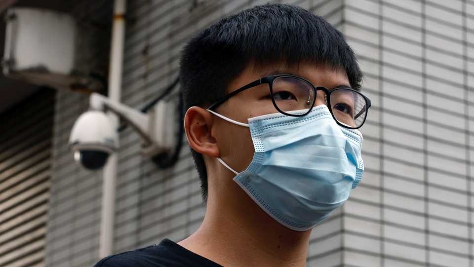 Activist Joshua Wong speaks to media after being arrested for participating in an unauthorised assembly last year, in Hong Kong, China. September 24, 2020.