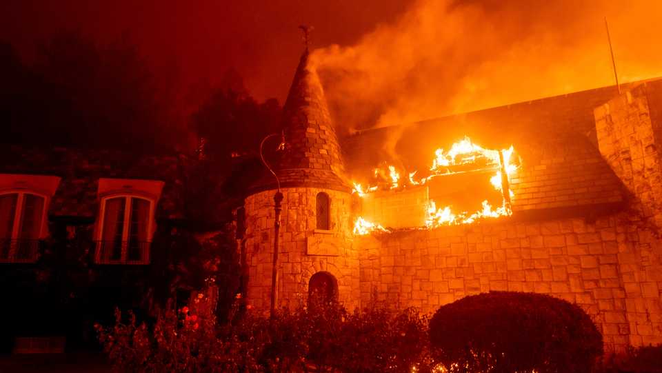 Flames from the Glass fire consume the Chateau Boswell Winery in St Helena, CA, US, Sunday, Sept 27, 2020.