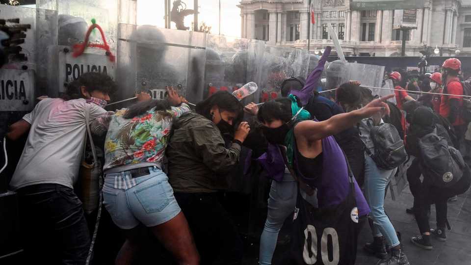 Supporters of the legalisation of abortion clash with riot police during a demonstration on International Safe Abortion Day, in Mexico City. September 28, 2020.