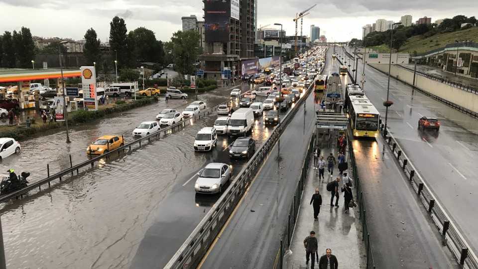 People in Istanbul had a hard time going to work due to flooding and heavy rains on Tuesday, July 18, 2017.