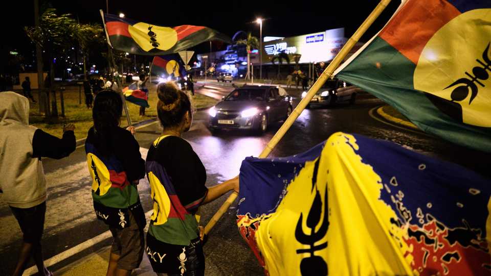 Kanak independence supporters wave flags of the Socialist Kanak National Liberation Front (FLNKS) after the referendum on independence on the French South Pacific territory of New Caledonia, Noumea, France, October 4, 2020.