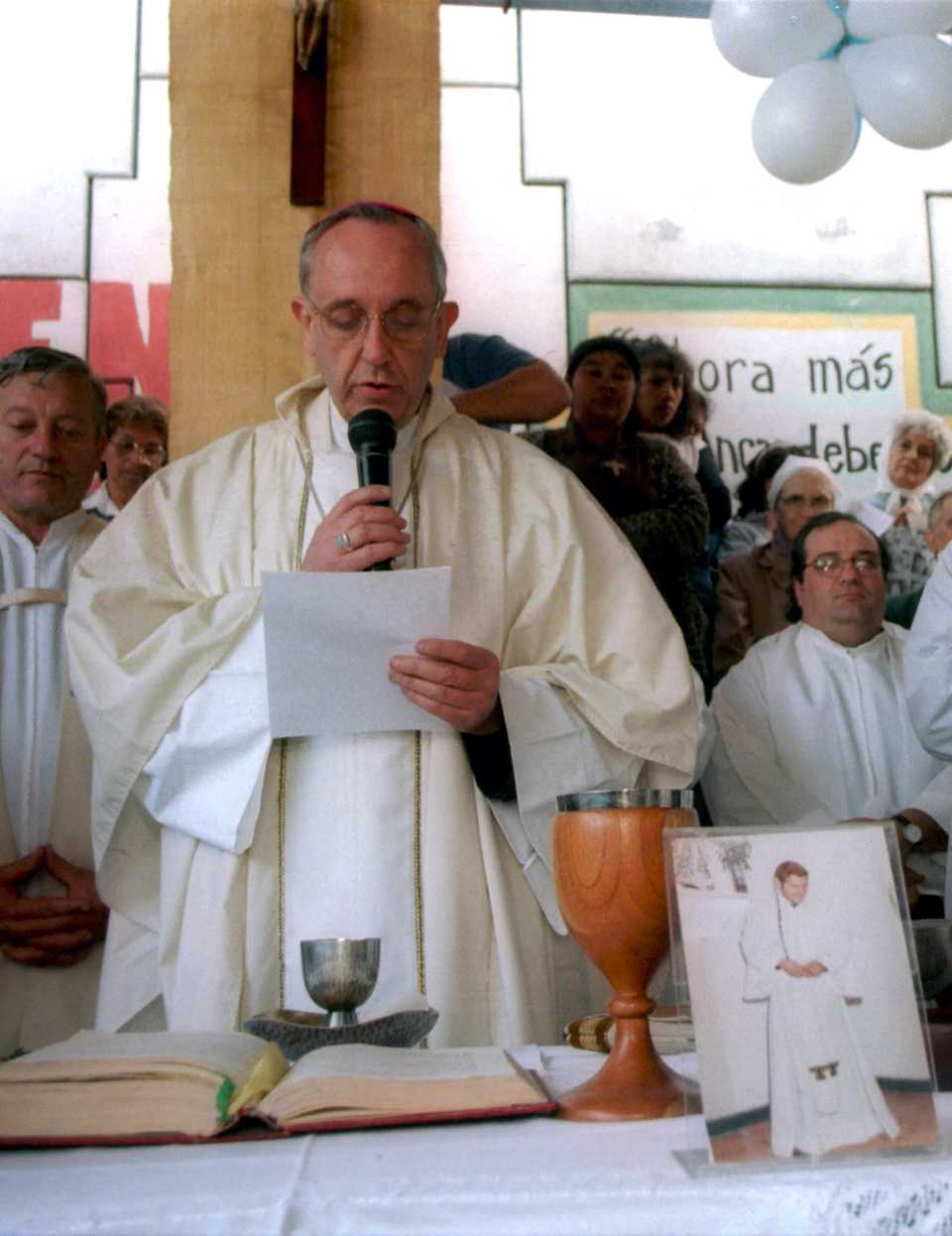 In this 2000 photo, Argentina's Archbishop Jorge Mario Bergoglio (Pope Francis) speaks during a Mass in honor of slain priest Carlos Mugica, an advocate of Liberation theology, who was assassinated by the Argentine Anti-Communist Alliance, in 1974.