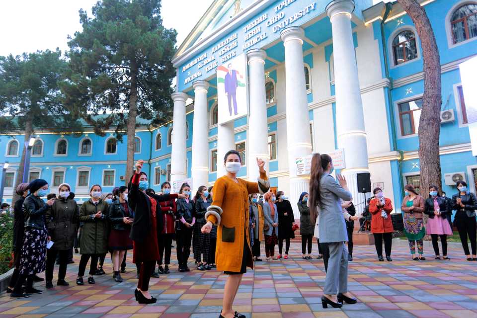 Voters dance near a polling station in Dushanbe, Tajikistan, on October 11, 2020.