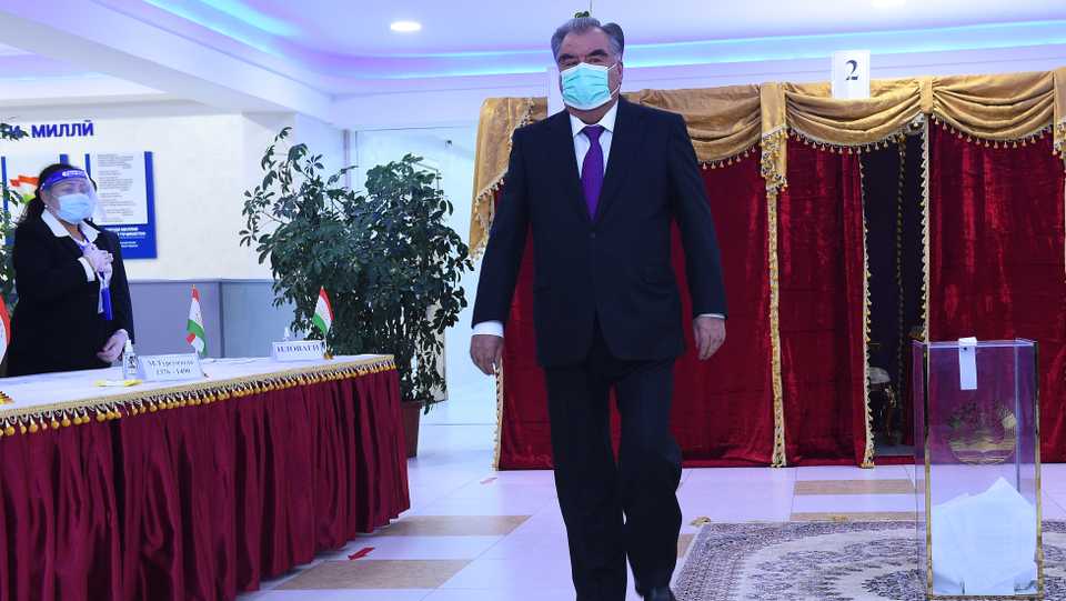 President Emomali Rakhmon walks after voting at a polling station during Tajikistan's presidential election in Dushanbe on October 11, 2020, amid the ongoing coronavirus pandemic.
