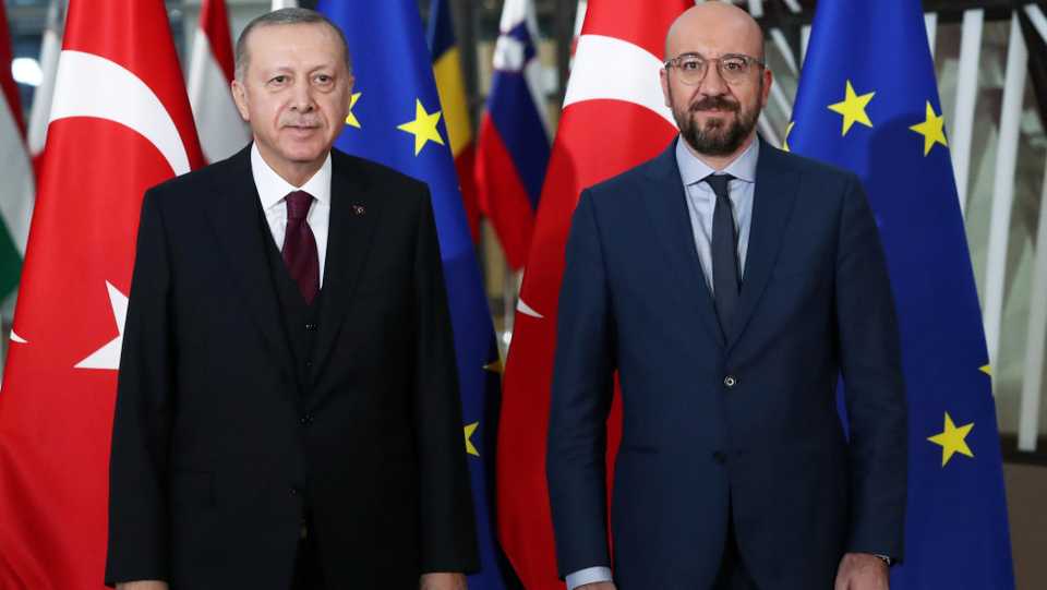 Turkish President Tayyip Erdogan and EU Council President Charles Michel pose in Brussels, Belgium, March 9, 2020.