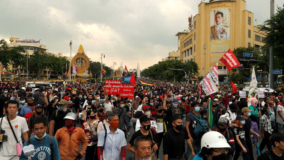 Demonstrators in Bangkok, Thailand, march during a Thai anti-government mass protest on the 47th anniversary of the 1973 student uprising. October 14, 2020.