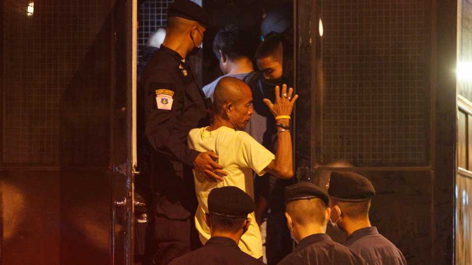 A pro-democracy protester is arrested by police in Bangkok. Thailand, October 15, 2020.