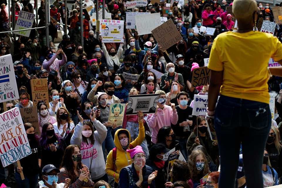 Demonstrators rally as they take part in the nationwide Women's March on October 17, 2020, in New York City.