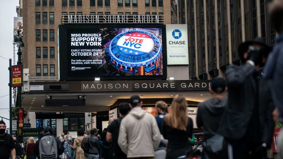 Voters outside Madison Square Garden on the first day of early voting in Manhattan, New York, US October 24, 2020.