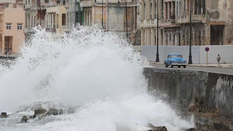 Waves splash at the seafront Malecon during the passage of the Tropical Storm Laura in Havana, Cuba, August 24, 2020.