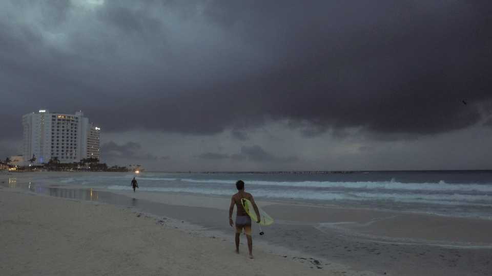Clouds gather over Playa Gaviota Azul as Tropical Storm Zeta approaches Cancun, Mexico, early on Monday morning, October 26, 2020.