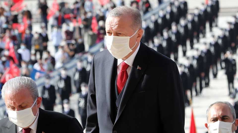 Turkish President Recep Tayyip Erdogan (C) visits Anitkabir, the mausoleum of Turkish Republic founder Mustafa Kemal Ataturk, for the 97th anniversary of the Republic Day in Ankara on October 29, 2020.