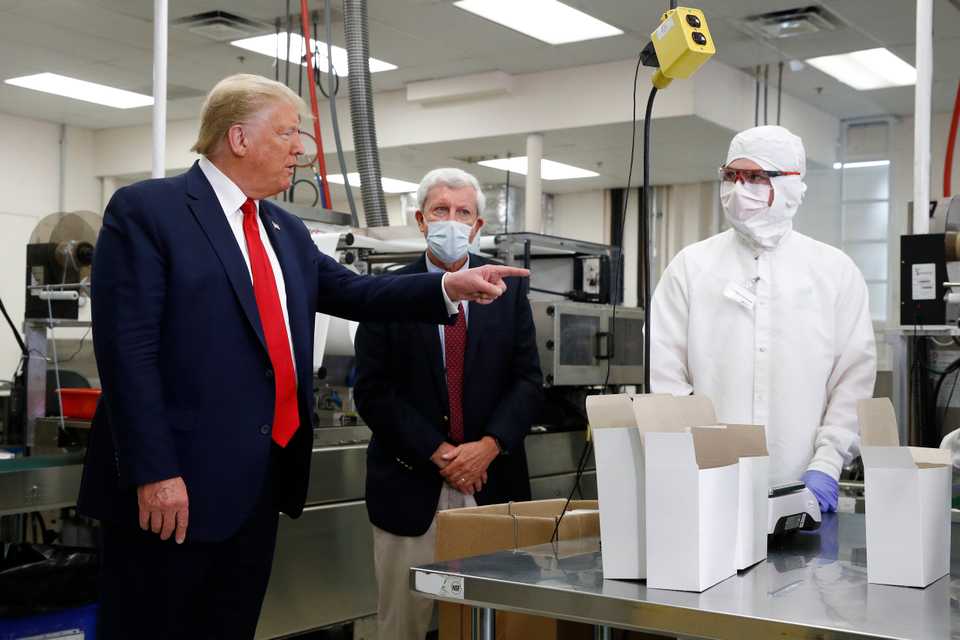 President Donald Trump tours Puritan Medical Products medical swab manufacturing facility, Friday, June 5, 2020, in Guilford, Maine.
