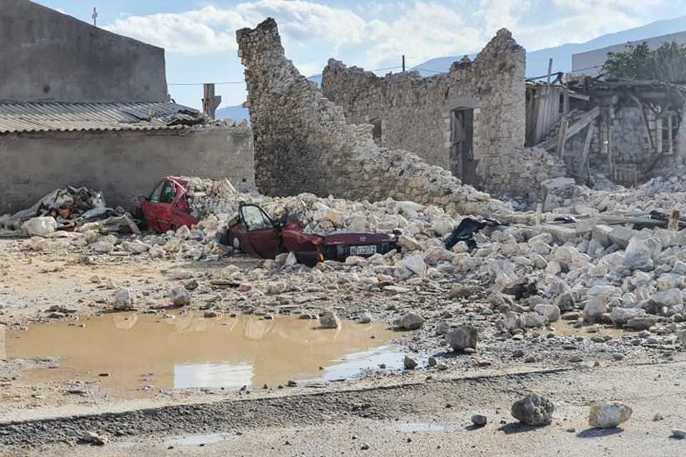 This picture shows destroyed car and collapsed buildings after an earthquake in the island of Samos on October 30, 2020.