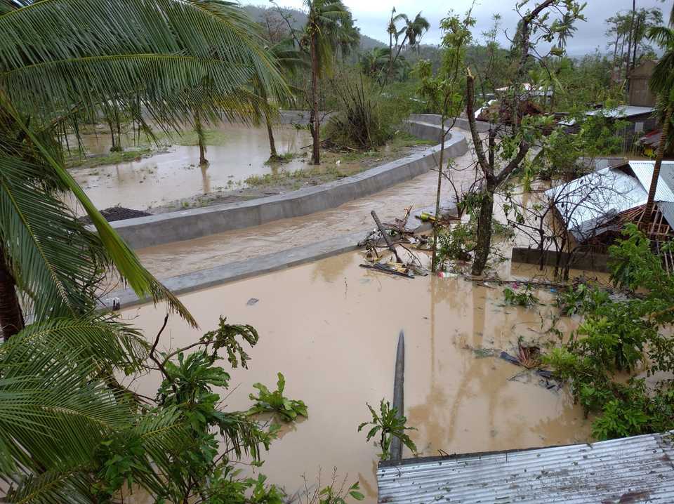A view of floodwater and damaged houses in the aftermath of Typhoon Goni in Bariw, Camalig, Albay Province, Philippines, November 1, 2020.