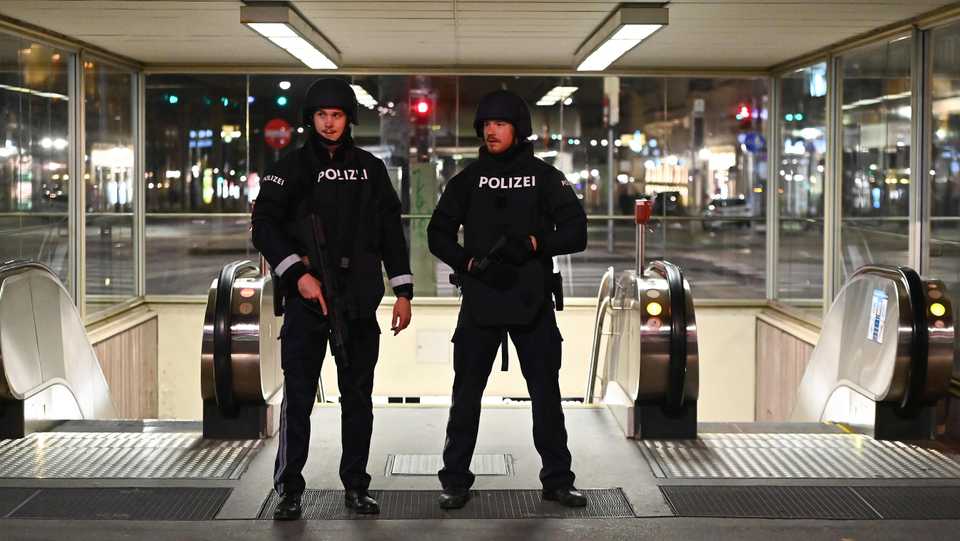 Armed policemen patrol near the state opera following the shooting in the centre of Vienna, Austria, on November 2, 2020.