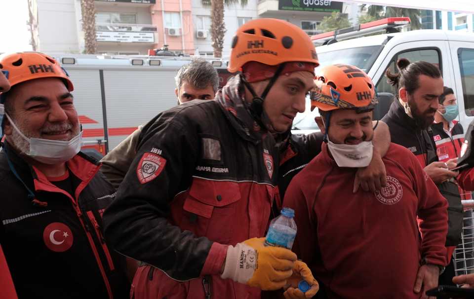In this photo, rescue workers congratulate each other after saving Ayla, a four-year-old girl who was trapped under the rubble for 91 hours after a strong earthquake hit Izmir on Friday, October 30, 2020. The photo was taken on November 3, 2020, Izmir, Turkey.