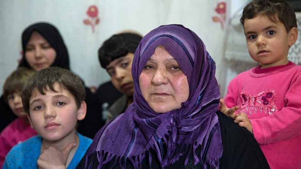58 year old Syrian refugee Varde Haci (R-2), who lost her 2 daughters and son in laws during the conflict in Syria, lives with her 20 grandchildren, son and daughters in Turkey's Gaziantep Province. Picture taken on March 4.