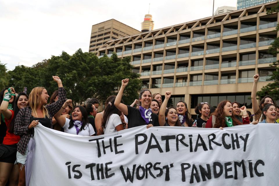 People participate in a rally for International Women's Day in Sydney, Australia, March 8, 2021.