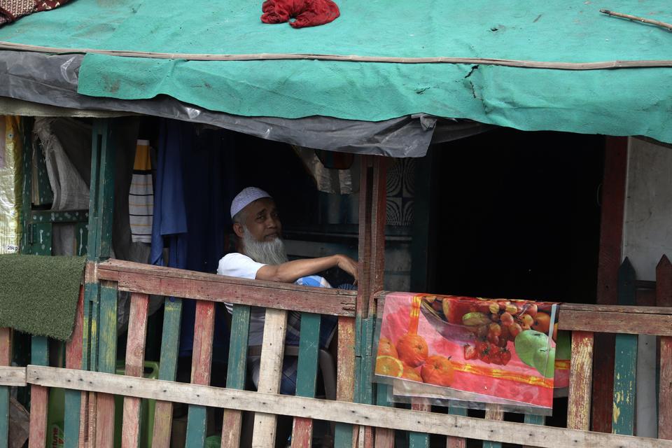 60-year-old Abdullah Hamid at his tin-shack in one of the camp areas, which hosts about 6,000 other refugees.