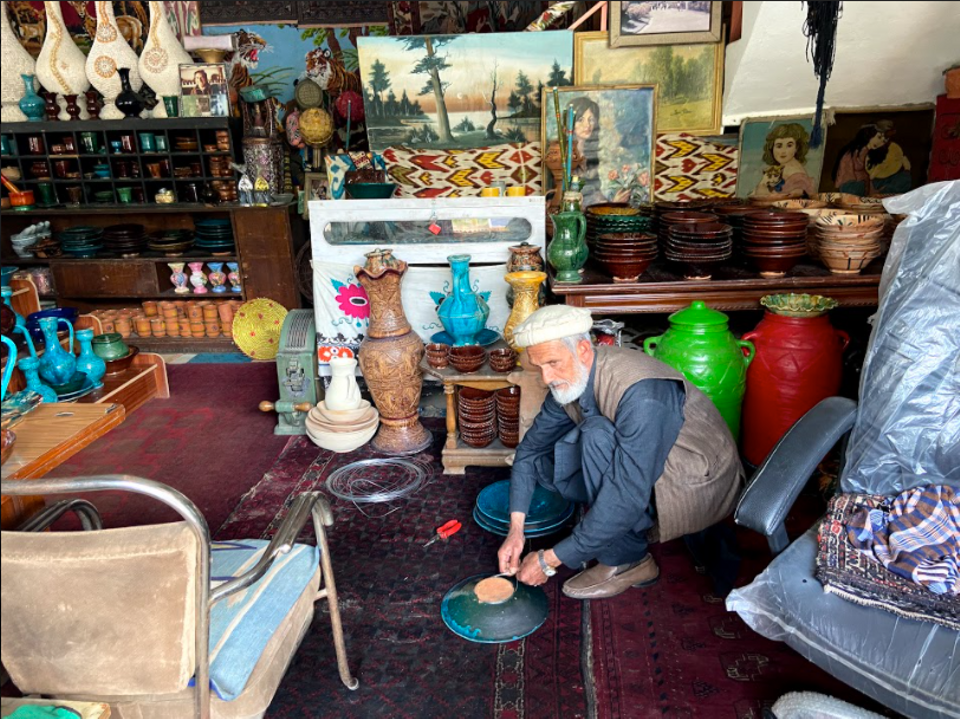 A shop in Istalif selling a variety of ceramics of all colors and shapes – bowls of all sizes, plates and platters, vases, urns and teapots,